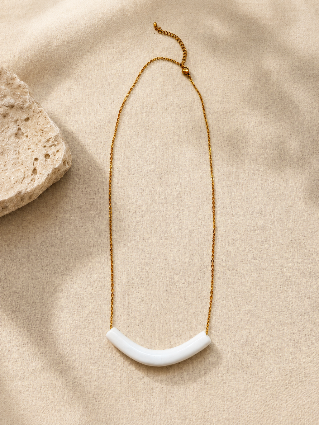Arco · Collar de porcelana