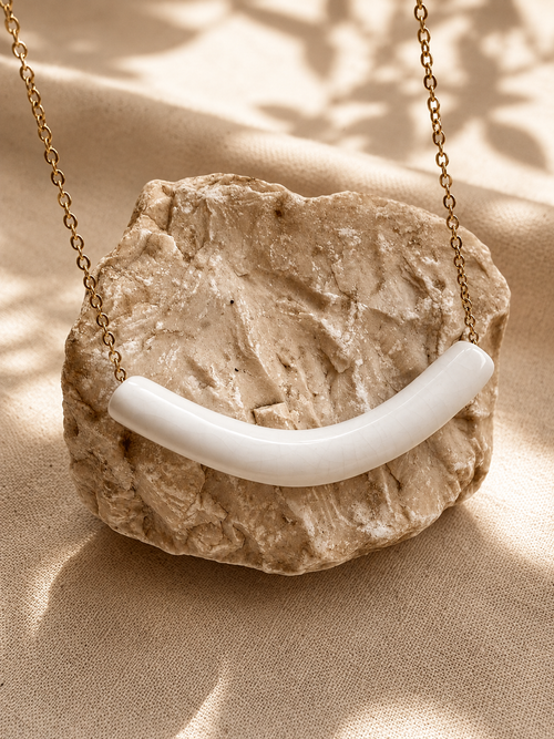 Arco · Collar de porcelana