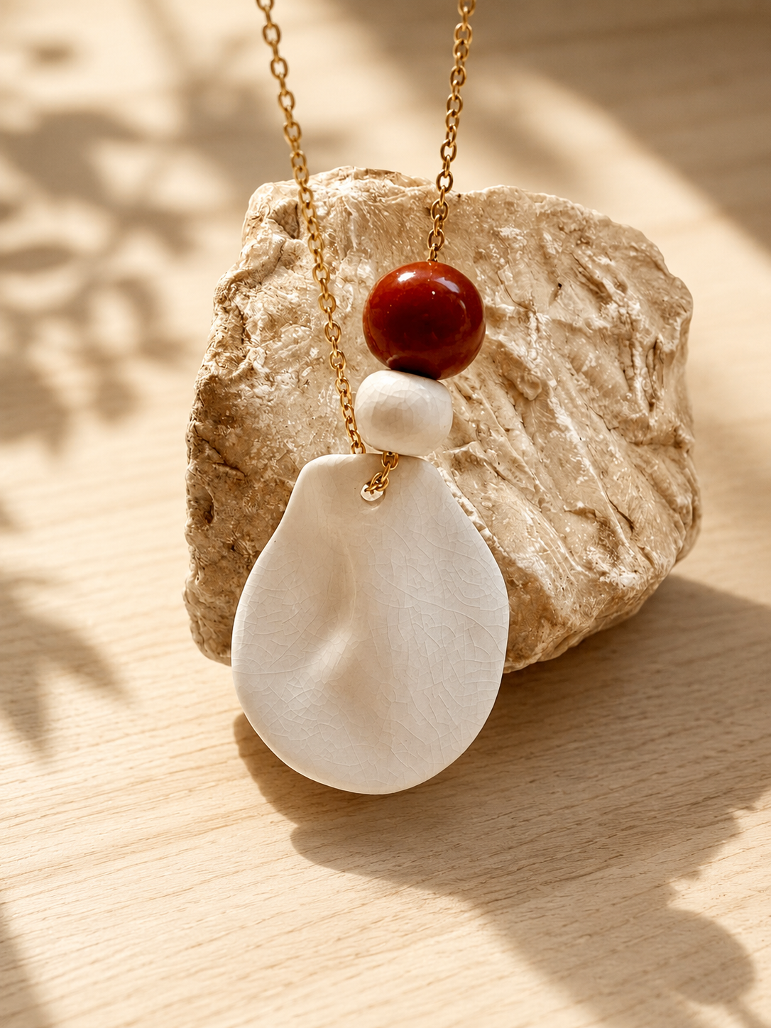 Astro · Collar de porcelana